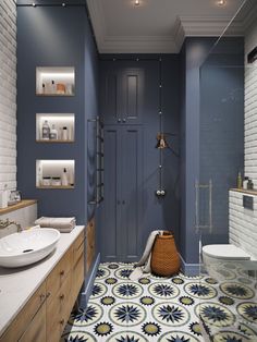 the bathroom is decorated in blue and white