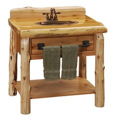 a wooden sink with two towels hanging from it