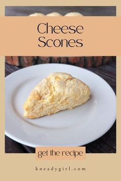 cheese scones on a white plate with the words get the recipe written below it