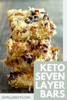 keto seven layer bars stacked on top of each other with the text overlay