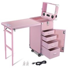 a pink vanity desk with drawers and hair dryer on it's side, in front of a white background