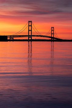 the golden gate bridge at sunset as seen from across the bay