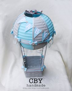 a blue and gray lantern with numbers on it