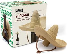 a hat shaped like a bottle opener in front of a box with the lid open