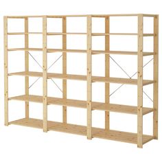 an unfinished shelving unit with four shelves on one side and three rows on the other