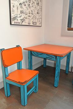 two children's chairs and table in a room