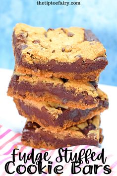 fudge stuffed cookie bars stacked on top of each other with the title above it