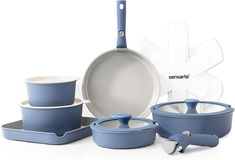 an assortment of blue pots and pans