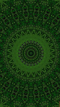 a green and black circular design with many smaller circles in the center, on a dark background