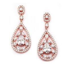 Rose Gold CZ Teardrop Wedding EarringsThese glistening rose gold plated Cubic Zirconia bridal earrings have a gorgeous design of pear and marquise shaped cz crystals framed by smaller CZ gems. These delicate earrings will add glamorous sparkle for the bride or her bridesmaids.Size: 1 3/4" long and 3/4" wide.Color: Rose Gold.Style: 4093ERG.Need several pair of earrings for your wedding party? You can buy in bulk and save!Please allow 1 week for U.S. delivery.Shipping Policy.Return Policy Cubic Zirconia Bridal Earrings, Rose Gold Dangle Earrings, Rose Gold Bridal Earrings, Vintage Chandeliers, Formal Earrings, Minnie Mouse Earrings, Statement Chandeliers, Wedding Earrings Drop, Classy Jewelry