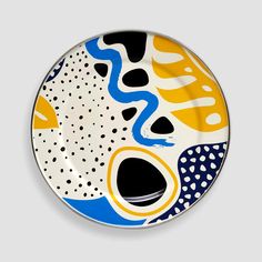 a plate with an abstract design on it