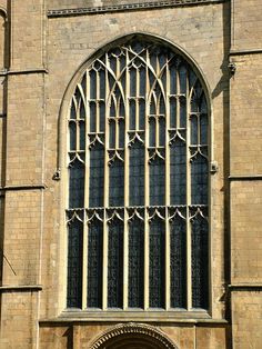 an old building with a large arched window