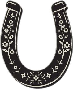 a black and white horseshoe with flowers on it