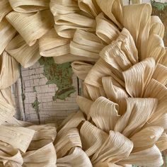 a close up of a wreath made out of wood