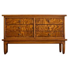 a wooden dresser sitting on top of a white background