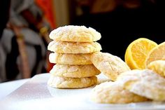 a stack of lemon cookies sitting on top of a table