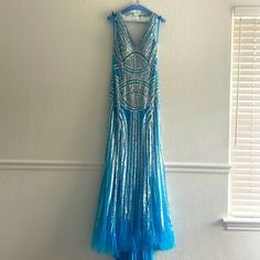 This Is An Original Jovani Formal Gown; Size 8; Aqua Color With Silver Metallic Designs; Lined; Zips In Back; Has Been Professionally Dry Cleaned And Worn Once. Length Is Long, Tapers Longer In Back; Gorgeous On Metallic Design, Jovani Dresses, Formal Gown, Aqua Color, Size 8 Dress, Metal Design, Formal Gowns, Design Color, Blue And Silver