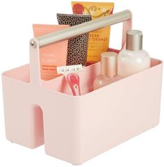 a pink plastic container with various items in it