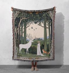 🌿 Enchanted Forest Woven Blanket with Deer, Fox, and Maiden - Nature-Inspired Fantasy Tapestry for Cozy Home Decor 🌿 This magical woven blanket depicts an enchanting forest scene with a white deer, a fox, and a maiden, framed by tall trees and a distant castle. Ideal for those who love fantasy and nature-inspired decor, this cozy throw adds a touch of whimsy and warmth to any space. 🌟 Product Specifications 🌟 - Material: 100% cotton for exceptional softness and durability - Size Options: Three sizes, including 80" x 60"--perfect for couches, beds, or a cozy reading nook - Design: High-quality woven artwork that maintains vibrant colors and intricate details - Weight: Lightweight yet warm, suitable for all seasons - Made in the USA: Ensures superior craftsmanship and sustainability 🚚 S Fantasy Book Nook, Old Book Design, Nook Bed, Weave Artwork, Art Nouveau Painting, French Fairy Tales, Picnic On The Beach, Fantasy Tree, Enchanting Forest