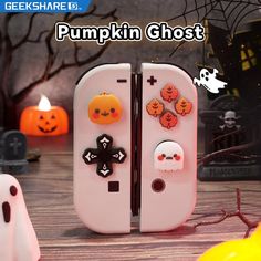 there is a white refrigerator with halloween decorations on the front and side doors, as well as pumpkins in the background