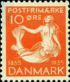 an orange and white stamp with a mermaid on it's back side, reads postmarke 10 ore damark