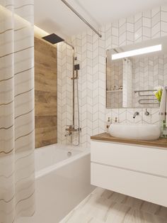 a bathroom with a sink, bathtub and shower