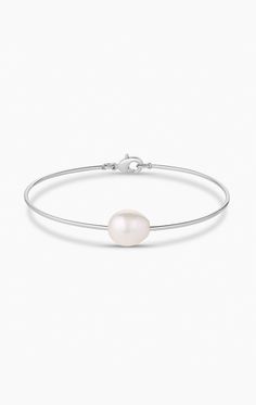 14k gold or rhodium plated freshwater pearl bangle bracelet with lobster clap closure. product note : freshwater pearls vary in texture, shape and size. These subtle differences make each pearl bracelet unique. Pearl Bangle Bracelet, Pearl Bangle, Pearl Bracelet, Bangle Bracelet, Rhodium Plated, Freshwater Pearls, Sale Items, My Jewellery, Bangle Bracelets