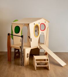 a child's play set made out of wood