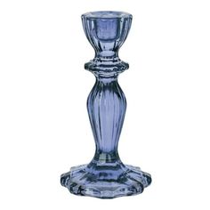 a blue glass candle holder on a white background