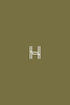 the word h is written in white on an olive green background, and it appears to be made up of letters