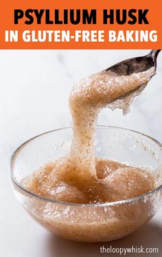 a bowl filled with sugar and sprinkled with powdered sugar, on top of a white table