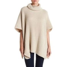 Steve Madden Ribbed Poncho Sweater - One Size In Beige. New With Tag! Retails $69, Selling For $39 **Note Has 1 Area On The Left Arm With 2 Discolored Threads, Very Minor Doesn't Affect Wear, See Last Pic ** Add Some Warmth To Any Look With This Ribbed Poncho Featuring A Turtleneck And Super Soft Knit. Size: One Size Fits Most Turtleneck Pullover Style Front Patch Pockets Side Vents 100% Acrylic Hand Wash An100 (Tags: Oversized, Drape, Loose, Funnel Neck, Cowl Neck, Short Sleeves, Ribbing, Rib, Steve Madden Poncho, Pullover Vest, Vest Layering, Cream Turtleneck, Black Poncho, Turtleneck Poncho, Grey Poncho, Zip Front Sweater, Poncho Wrap