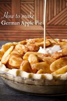 an apple pie with cream on top and the words how to make german apple pie