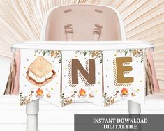 a one year old birthday banner with toast and vegetables on it in front of a chair