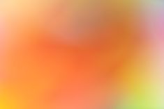 a blurry image of an orange and yellow background