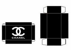 an open box with the word chanel printed on it and two smaller boxes next to each other