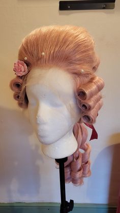 Achieve the pinnacle of 18th century style with this striking men's rococo wig, meticulously styled in the historic city of Bath, UK. This stunning wig is the perfect way to immerse yourself in the opulent world of the 18th century. Whether you're attending a masquerade ball, costume party, or historical reenactment, this wig will transform you into a true aristocrat of the rococo era. This style boasts authentic details from the 18th Century, incuding the ponytail 'queue', side 'buckle' roll de Rococo Wigs, Rococo Hat, Masquerade Ball Costume, 18th Century Wigs, Rococo Era, Ball Costume, City Of Bath, Bath Uk, Costume Ball