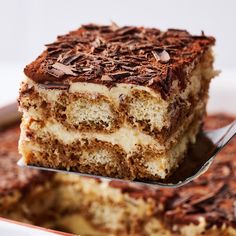 a close up of a piece of cake on a fork