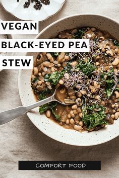 vegan black - eyed pea stew in a bowl with a spoon on the side