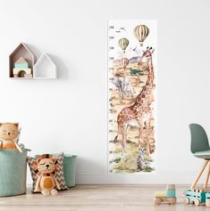 a child's growth chart with animals and hot air balloons in the sky on it