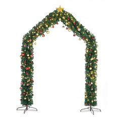 an arch decorated with christmas decorations and lights is shown in the shape of a star