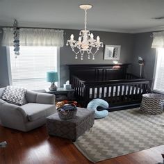 a living room filled with furniture and a chandelier