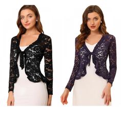 Opt for a decadent cover-up for your special occasions with this lace shrug. This stretchy lace cardigan offers the perfect balance to longer layers in a waist-defining cut with a tie front. Constructed in a classic shrug silhouette, this charming piece benefits from an open neck and elegant long sleeves with ruffles. Intricate design details include a satin binding around the front and hem and a floral lace design. Paired with a sleeveless dress, spaghetti strap, tank top, or simple off-shoulde Longer Layers, Drop Sleeve Sweater, Womens Henley, Black Shrug, Lace Shrug, Bolero Shrug, Women's Tie, Open Neck, Lace Cardigan