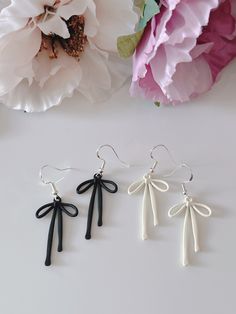 SIZE:  Earrings - 3.5 Drop length - 4.5  Note: I can change the earring findings (gold or silver hooks) to suit the preference. Just send a message for the request.  These charming bow earrings are two for the price of one, so you'll get both of these pairs. They are very easy to use, comfortable and yet stylish. Casual, the everyday accessories that you would like to have. Soft pastel colors of green and ivory, make it easier to fit in any outfit of your choosing. Whether you just want to use i White Bow Drop Earrings, Cute White Jewelry With Ribbon, Black Bow Jewelry Gift, Black Bow Jewelry For Gifts, Black Bow Jewelry For Gift, Black Bow Earrings For Party, Chic Black Jewelry With Bow, Black Bow Earrings As Gift, Black Bow Earrings For Gift