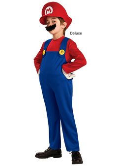 a boy in a mario costume with his hands on his hips and wearing a moustache