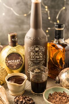 bottles of booze, coffee and spices on a table