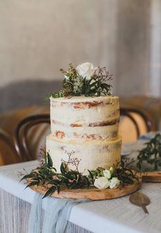 a wedding cake sitting on top of a table