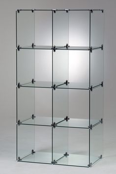 a glass shelf with six shelves on each side