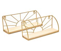 two gold metal and wood shelves on white background