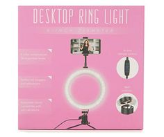 the ring light is set up in front of a pink box with instructions on how to use it